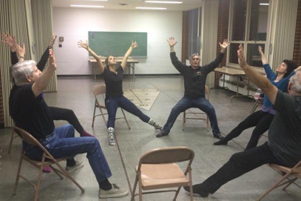 Sarah Levitt teaches community members about dance.