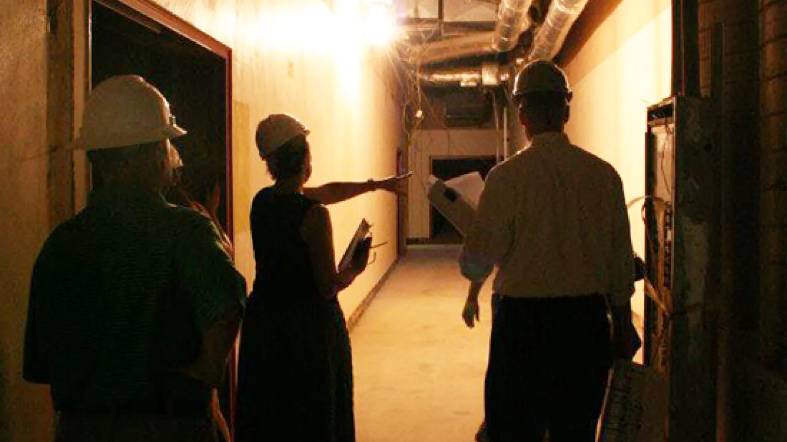Contractors inspecting Sullivant Hall
