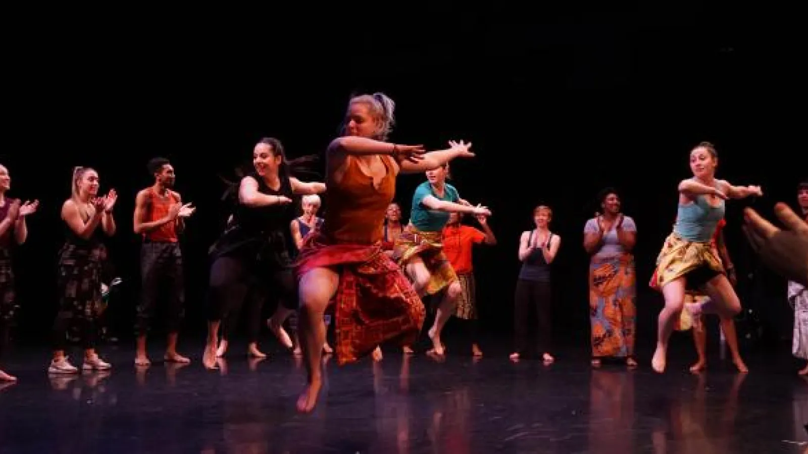 Suzan Bradford and company dancing