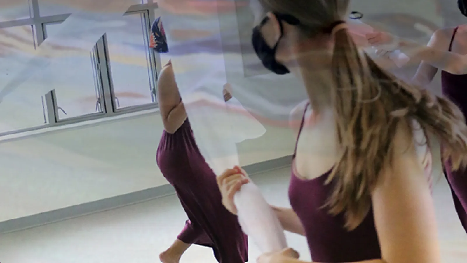 Dancers performing with fabric