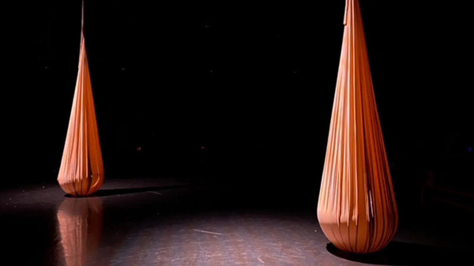 fabric pods hanging in theatre