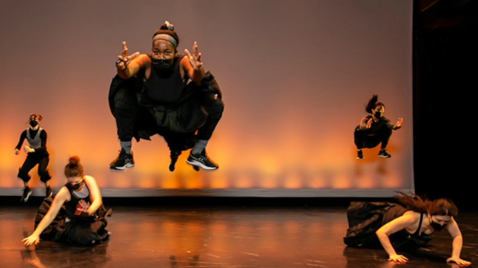 Dancers performing on a stage