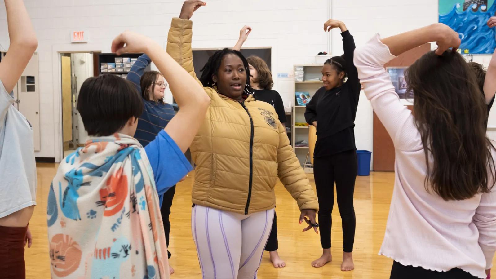 Students dancing in a gymnasium