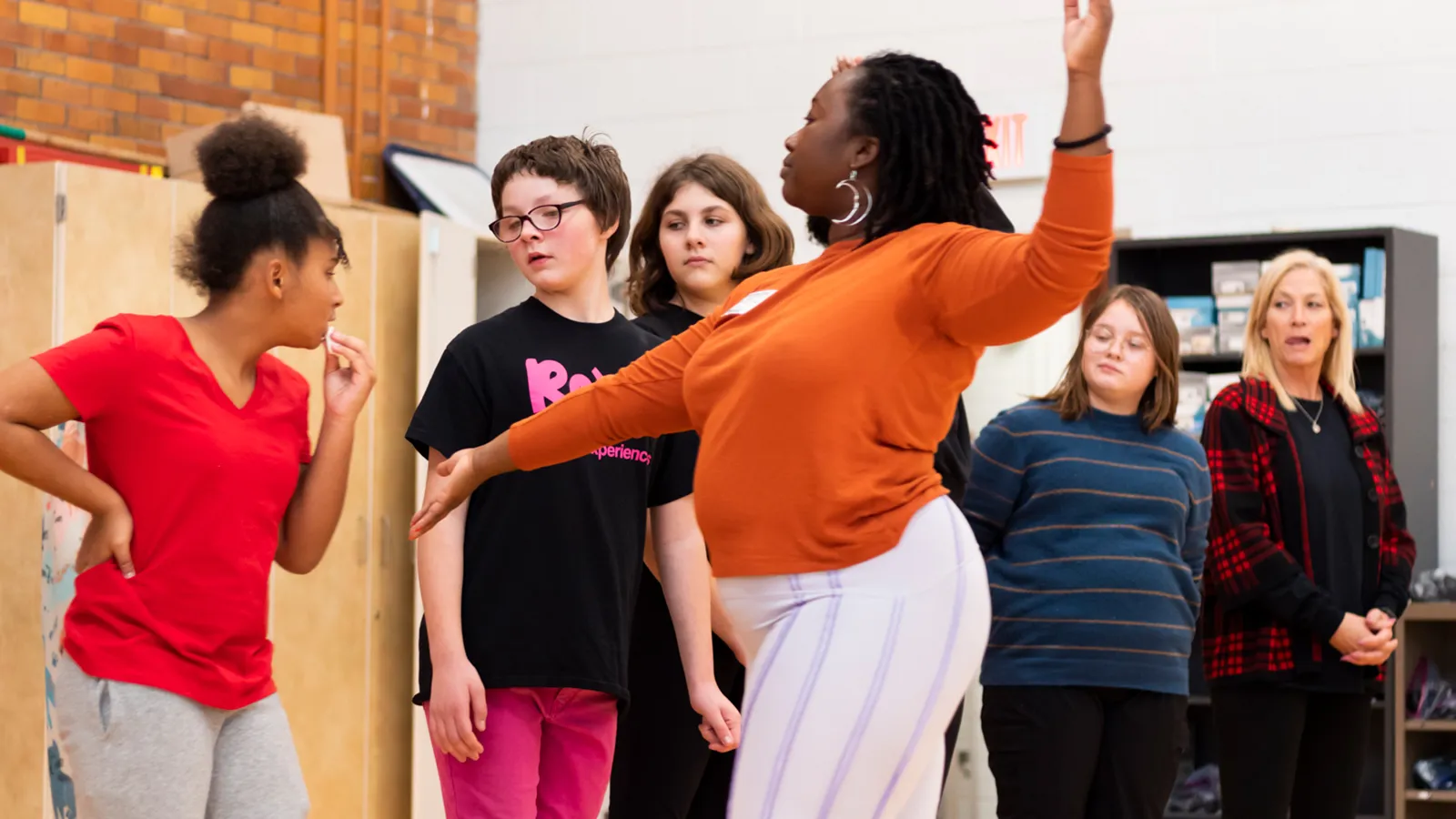 Students dancing in a gymnasium