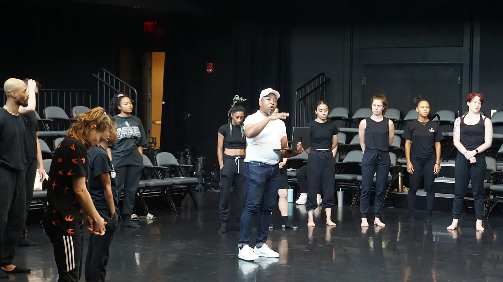 Dancers standing on a stage