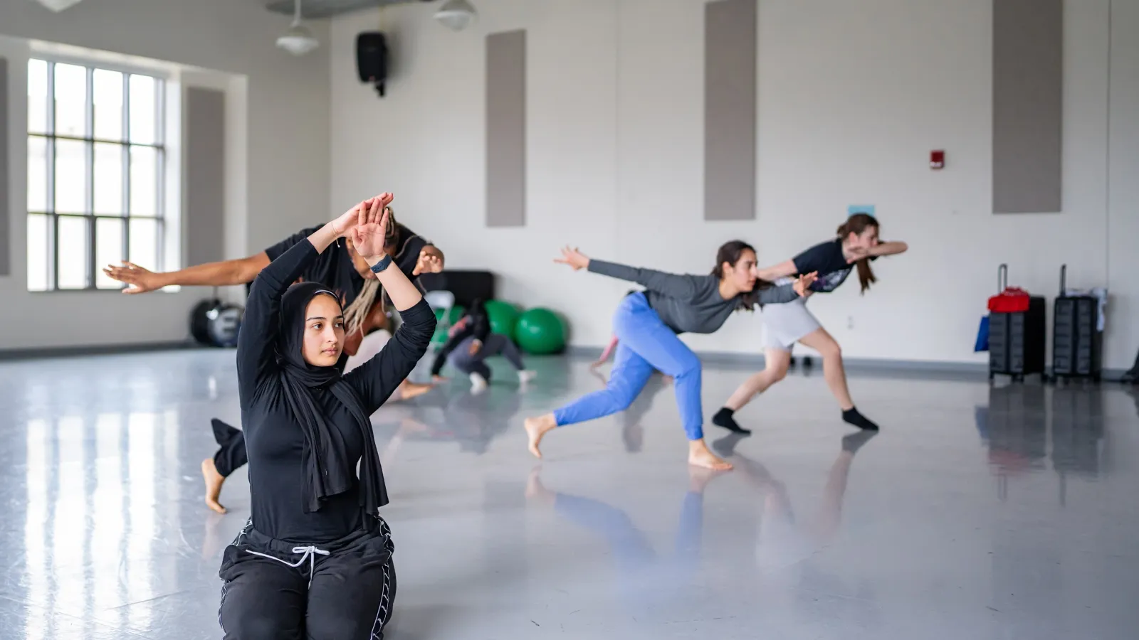 Dancers rehearsing in a studio
