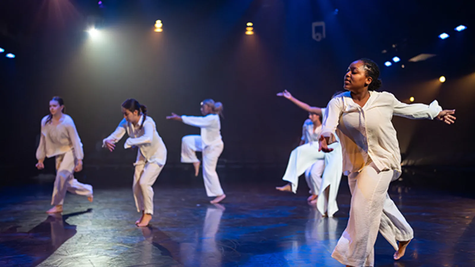 Dancers performing on a stage