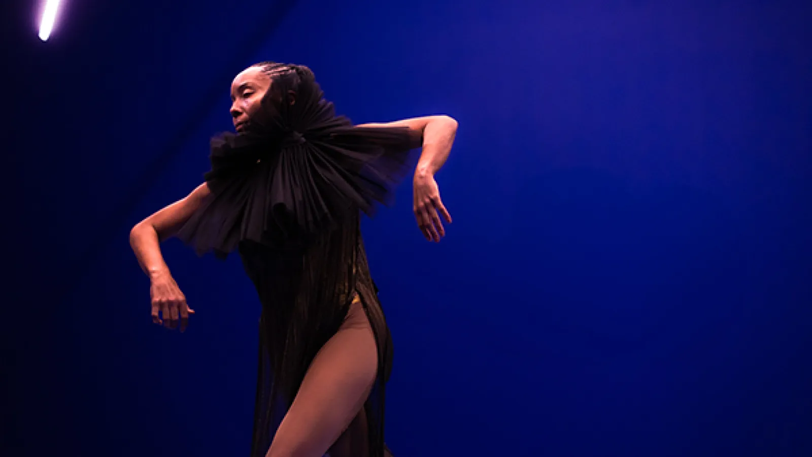 Dancer performing on a stage