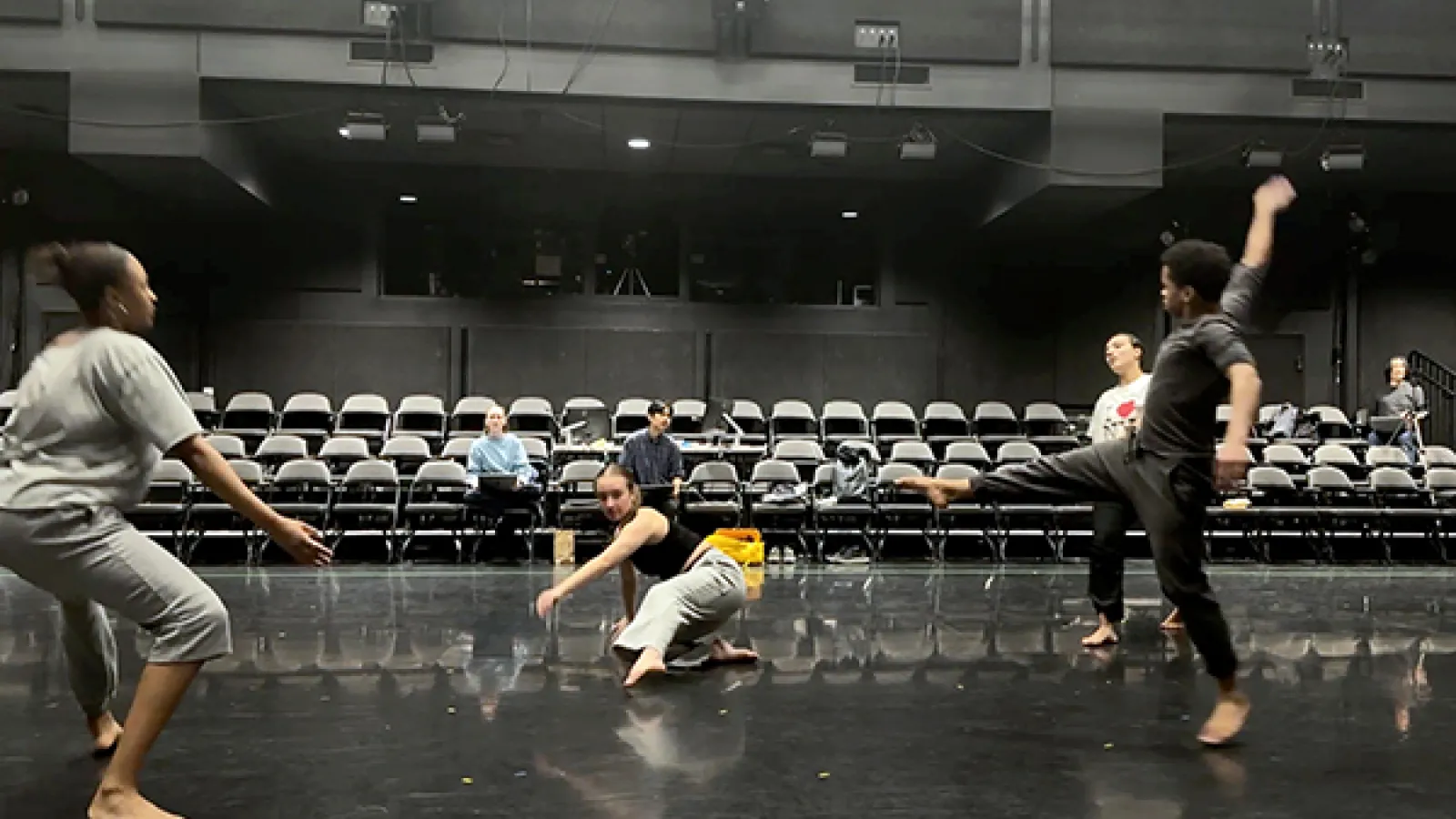 Dancers rehearsing on a stage