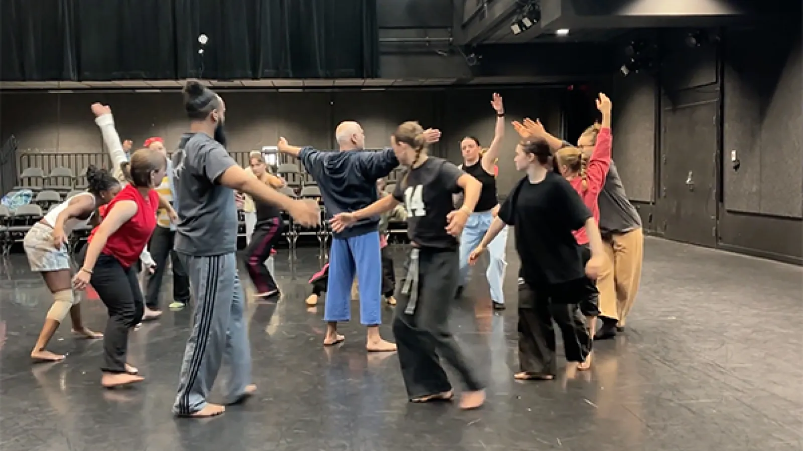 Dancers rehearsing on a stage