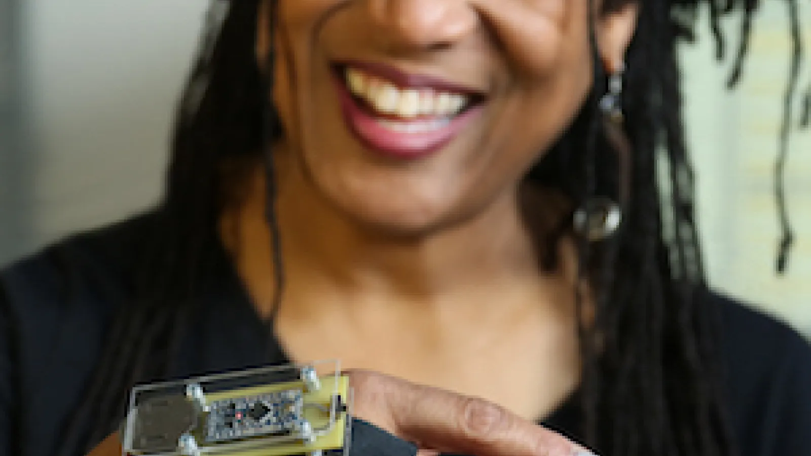 Pamela Z in her San Francisco Studio wearing a SensorPlay controller. | Credit: Goran Vejvoda