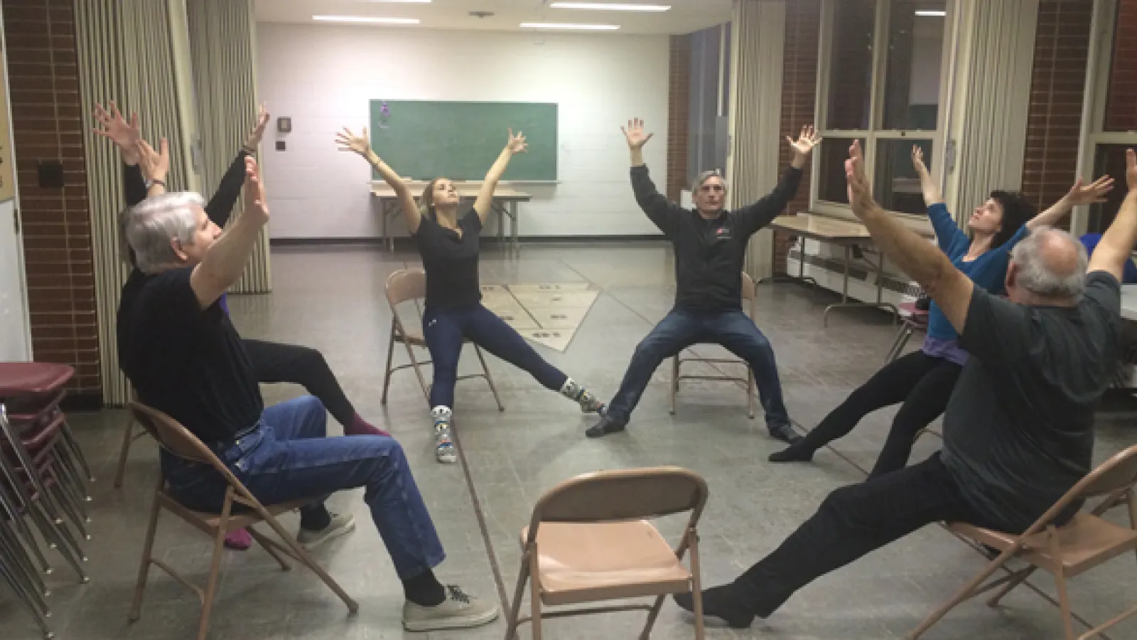 Sarah Levitt teaches community members about dance.