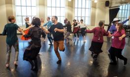 Assistant Professor Daniel Roberts (center) participates in Tracing Dances’ Inheritances in Sullivant Hall. Photo by Jess Cavender.