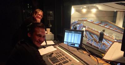 Robin Ediger-Seto and Carrie Cox in the Davidson Theatre booth during the tribute for Cheri Mitchell.