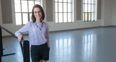 Lauren Bedal in front of windows in one of the Department's studios.