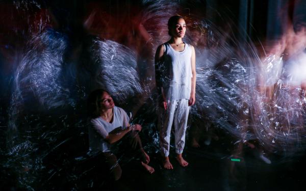 Dancers performing with video effects