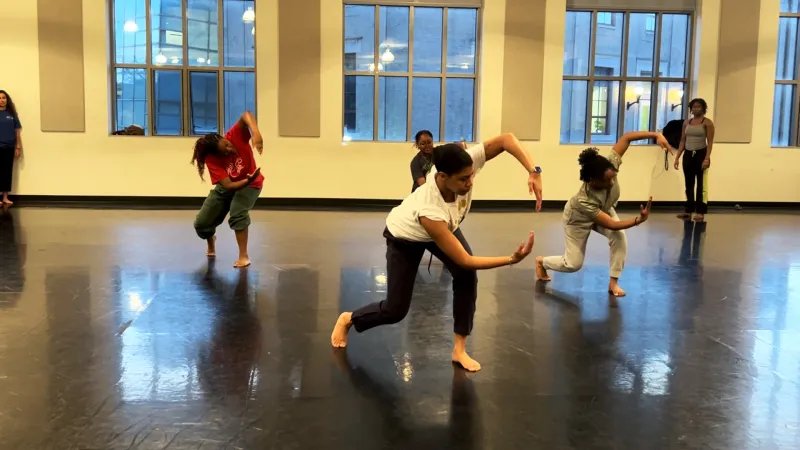 Dancers rehearsing in a studio
