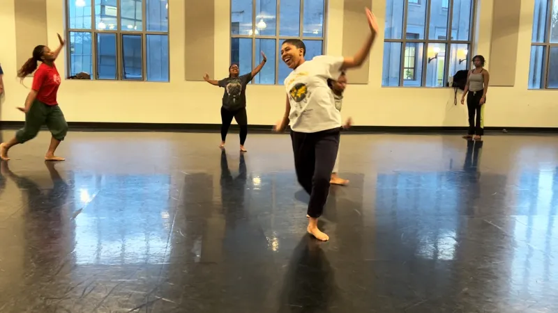 Dancers rehearsing in a studio