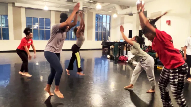 Dancers rehearsing in a studio