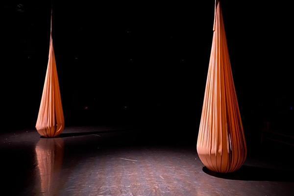 fabric pods hanging in theatre