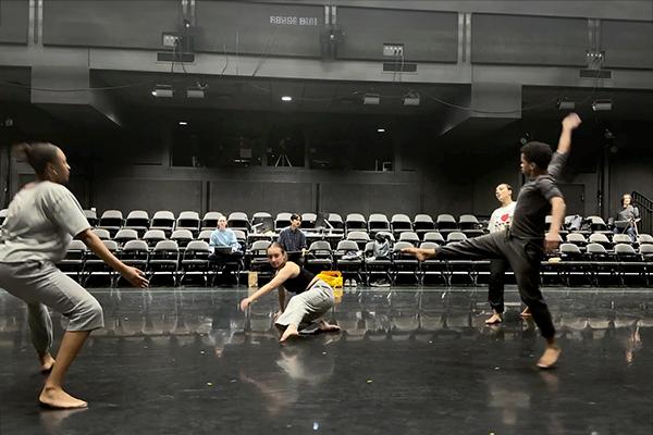 Dancers rehearsing on a stage
