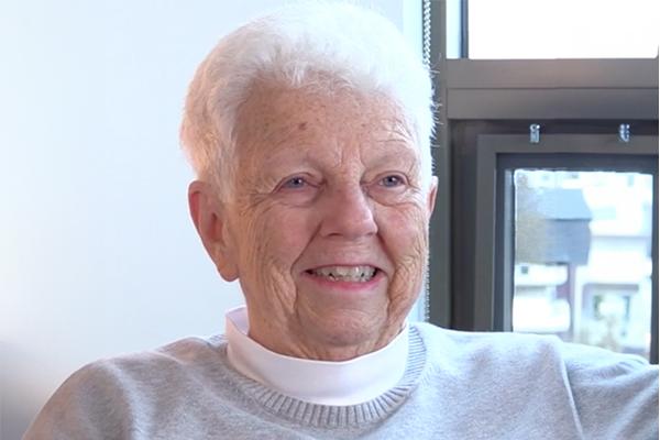 person with short white hair