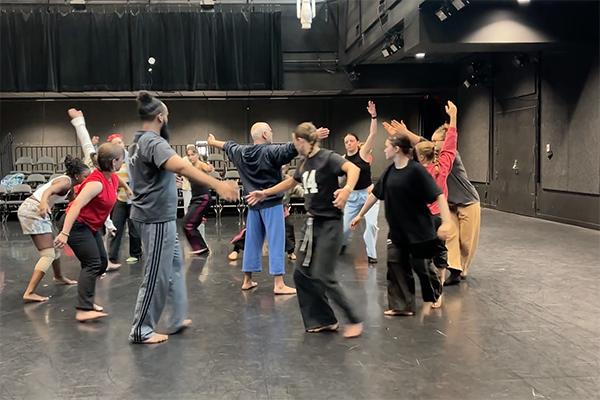 Dancers rehearsing on a stage