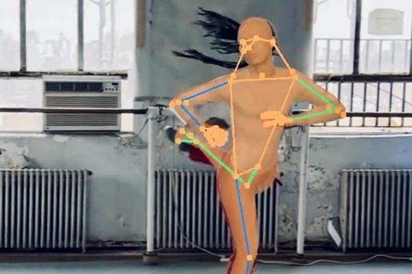 an image of an avatar of a dancer with dots and lines indicating movement points in a studio