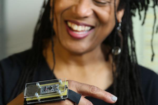 Pamela Z in her San Francisco Studio wearing a SensorPlay controller. | Credit: Goran Vejvoda