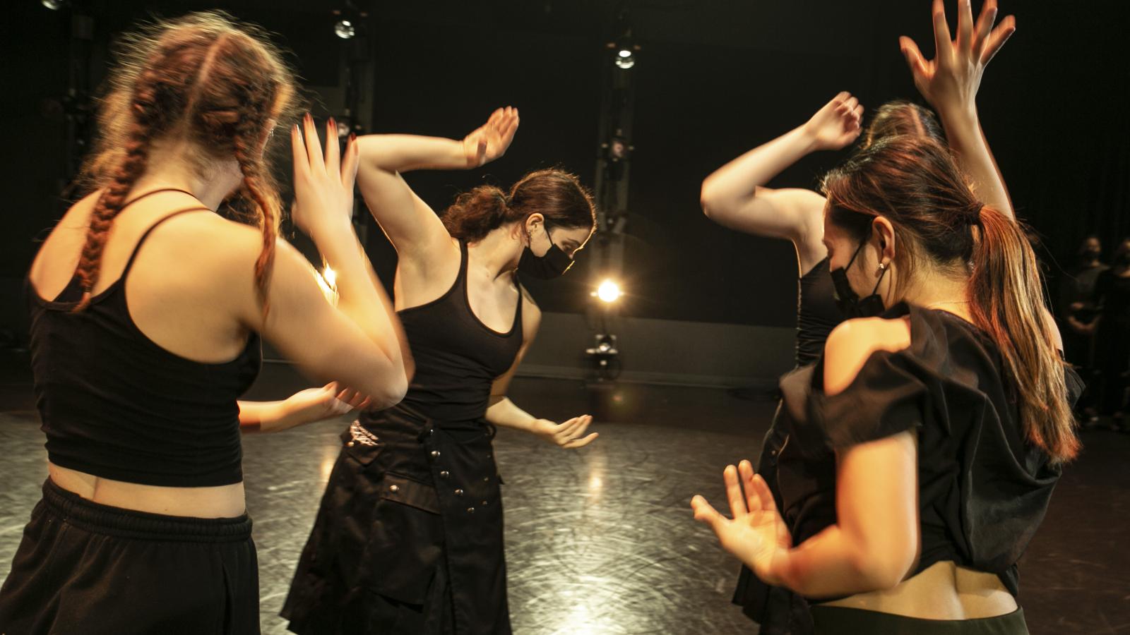 Dancers performing on a stage