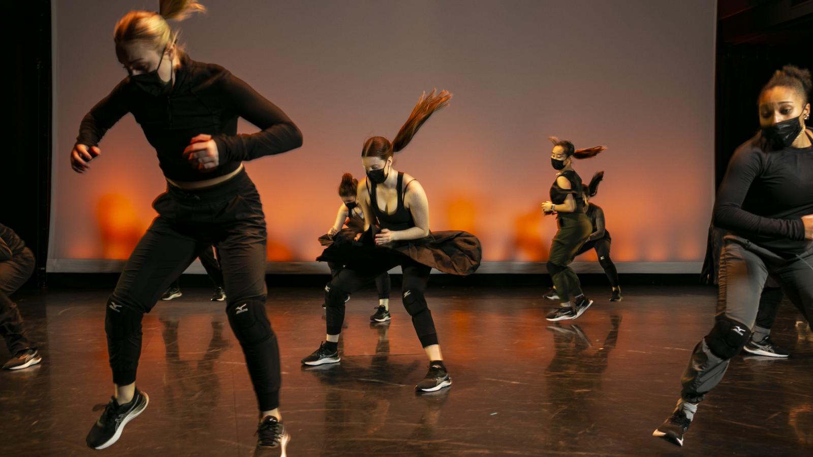 Dancers performing on a stage