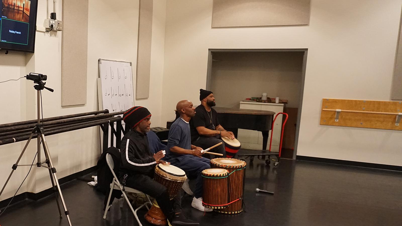 African drummers provide accompaniment for a dance class 