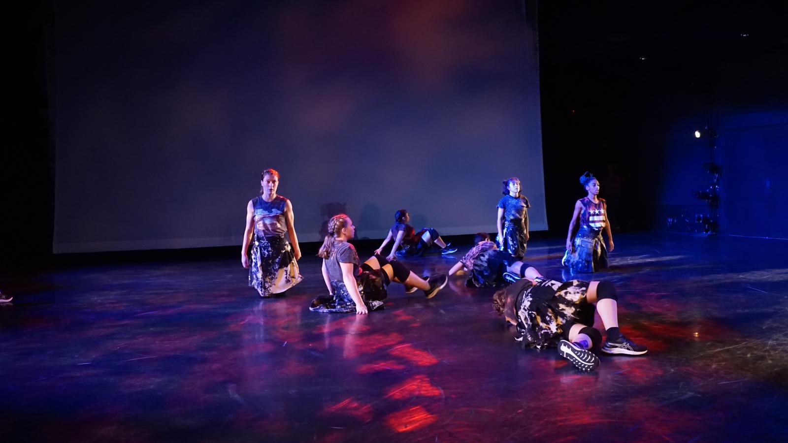 Dancers performing in a theatre