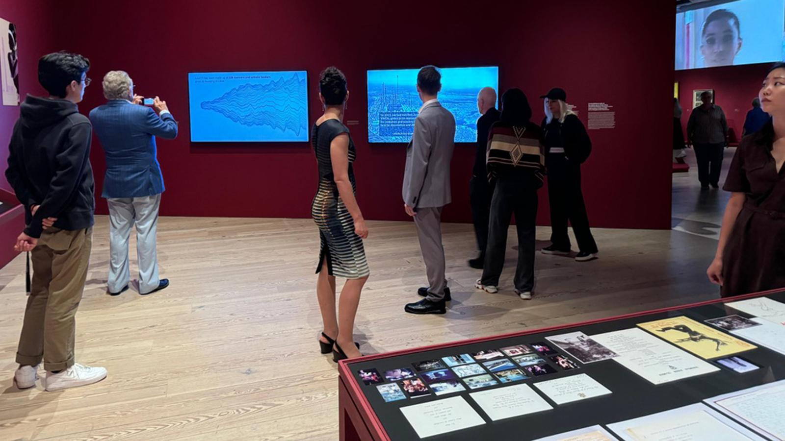 People looking at exhibit