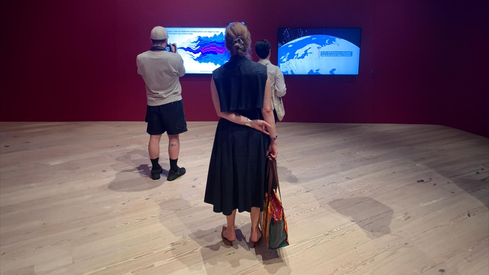 People looking at exhibit