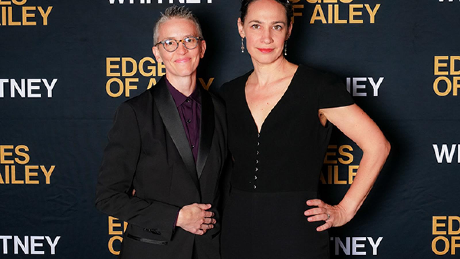 Two people standing together
