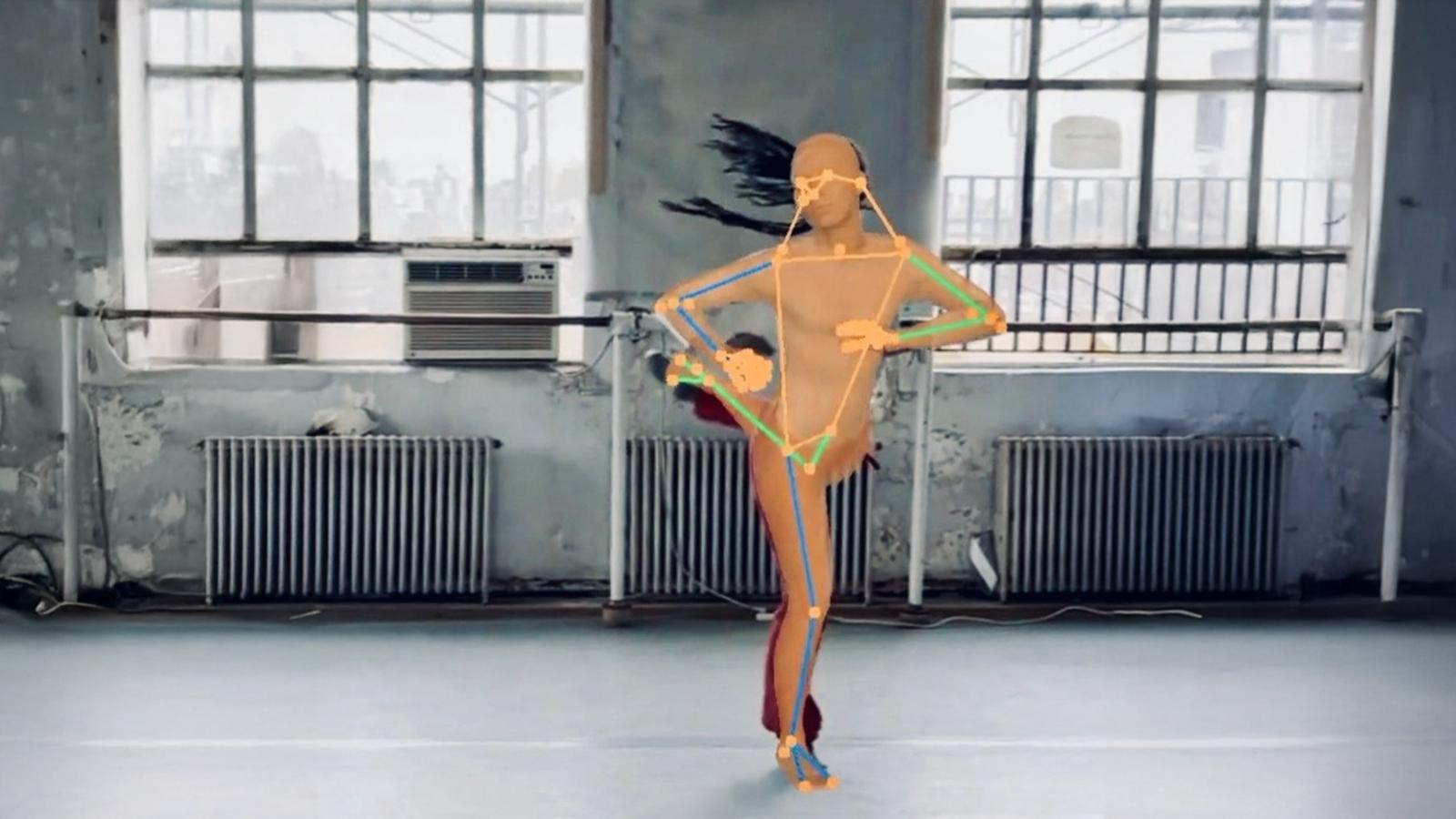an image of an avatar of a dancer with dots and lines indicating movement points in a studio
