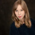 A person with long blonde hair