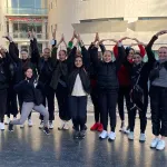 Women in front of building
